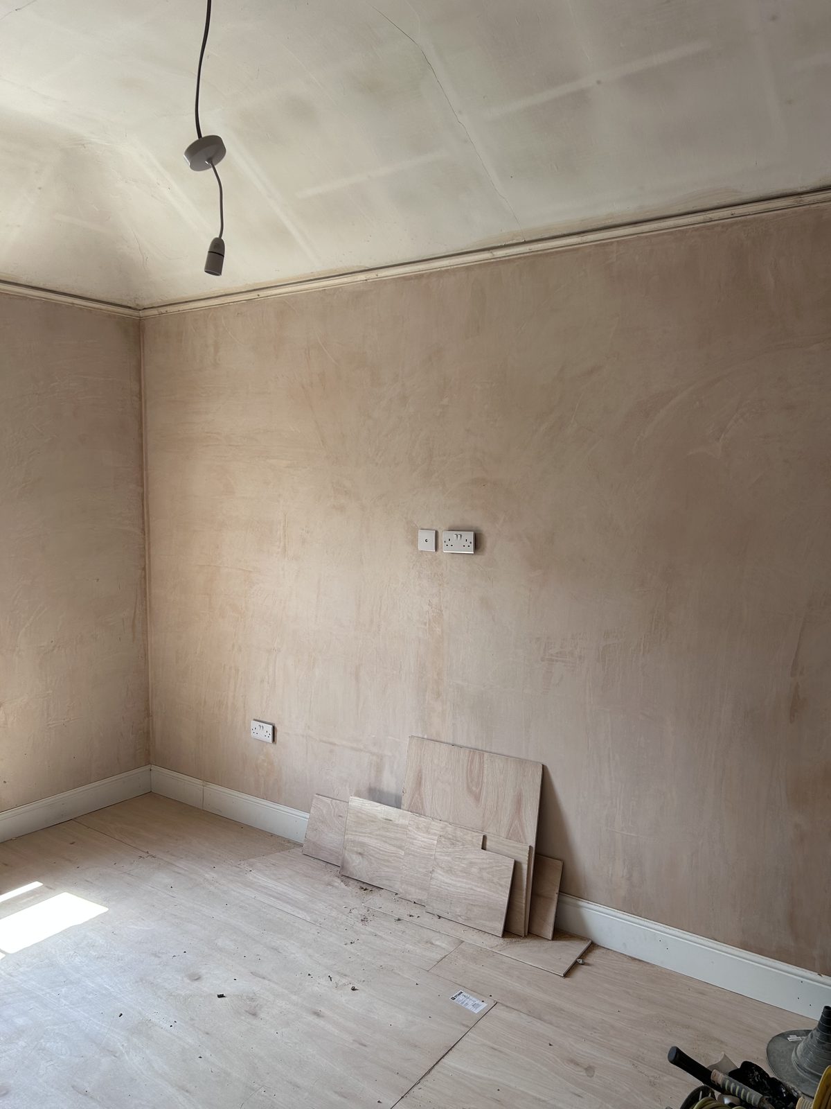Room mid-renovation with wiring and sockets installed before decoration, Leith property development